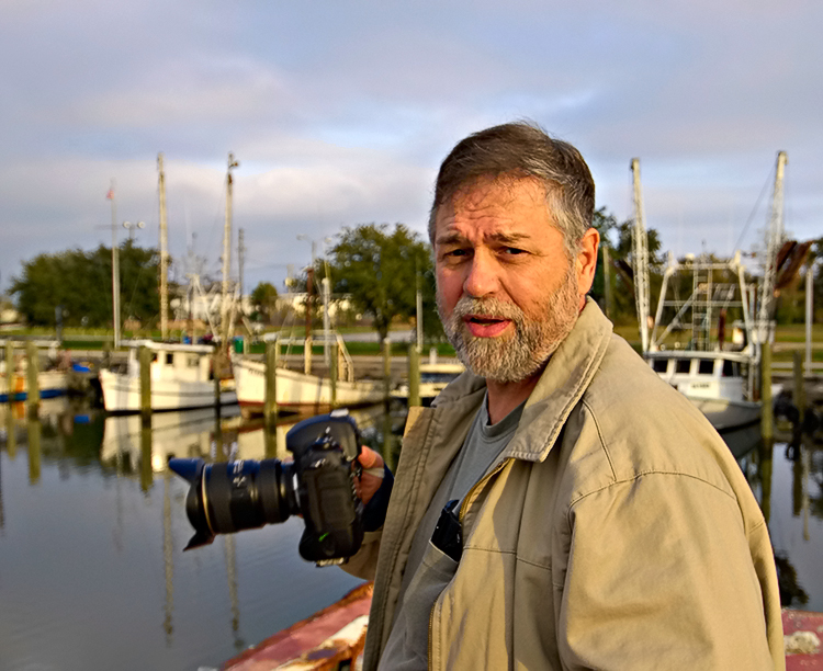Mark Lindquist photographing in Appalachicola, FL.  Photo by John McFadden